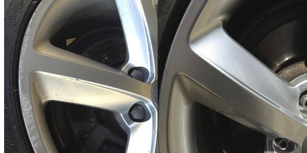 Audi alloy wheel before and after refurbishment