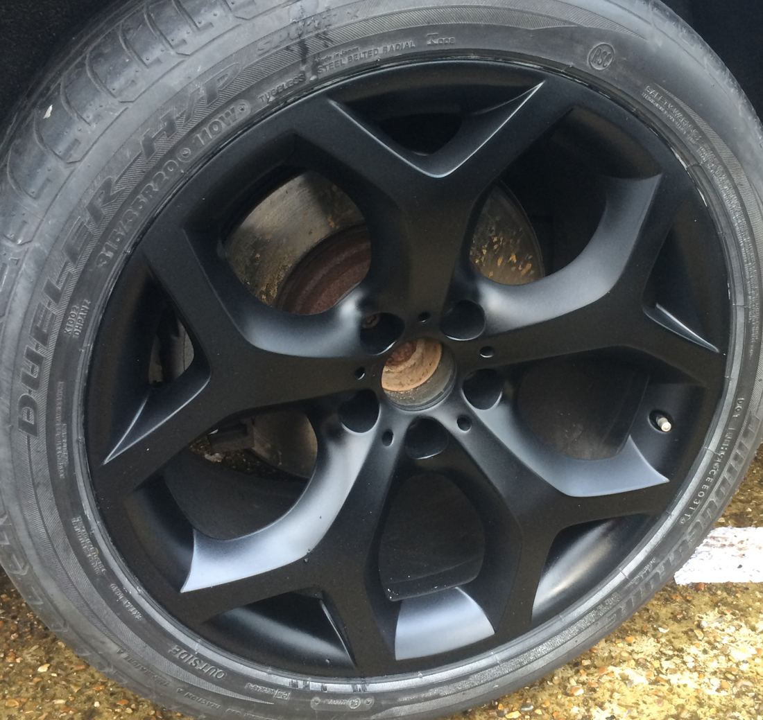 BMW X6 alloy wheel refurbished in a solid colour